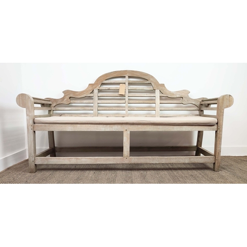 185 - GARDEN BENCH, Lutyens style in weathered teak, 196cm L x 105cm H, with cushion.