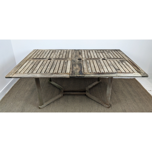 186 - GARDEN TABLE, weathered teak, 120cm W x 91cm D, folded but extending to 182cm H x 91cm D.