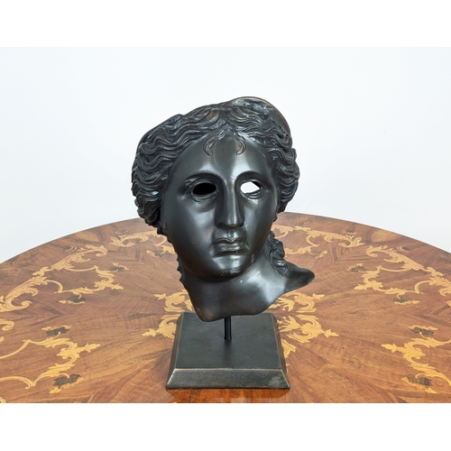 388 - CONTEMPORARY SCHOOL SCULPTURE, a Classical style of cut out face on stand, 47cm H x 30cm W x 25cm D.