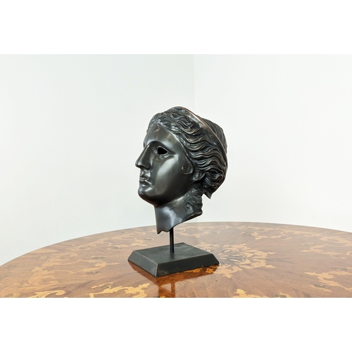 388 - CONTEMPORARY SCHOOL SCULPTURE, a Classical style of cut out face on stand, 47cm H x 30cm W x 25cm D.