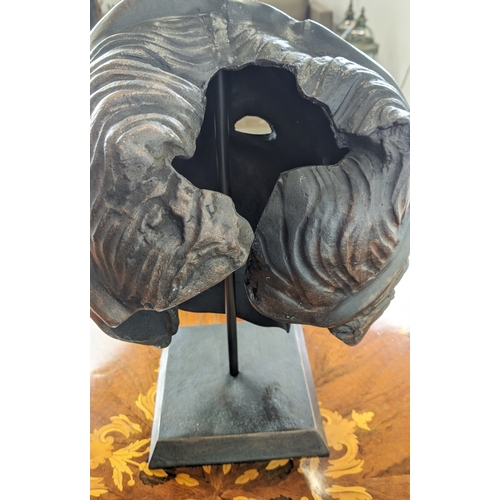 388 - CONTEMPORARY SCHOOL SCULPTURE, a Classical style of cut out face on stand, 47cm H x 30cm W x 25cm D.