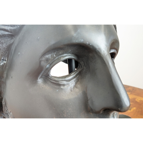 388 - CONTEMPORARY SCHOOL SCULPTURE, a Classical style of cut out face on stand, 47cm H x 30cm W x 25cm D.