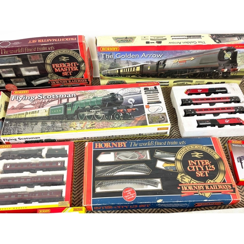 4 - HORNBY MODEL TRAIN SETS, including 'the flying Scotsman', and various others in original boxes along... 