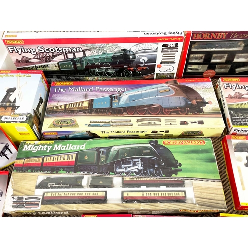 4 - HORNBY MODEL TRAIN SETS, including 'the flying Scotsman', and various others in original boxes along... 