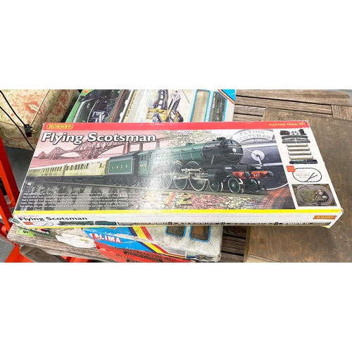 4 - HORNBY MODEL TRAIN SETS, including 'the flying Scotsman', and various others in original boxes along... 