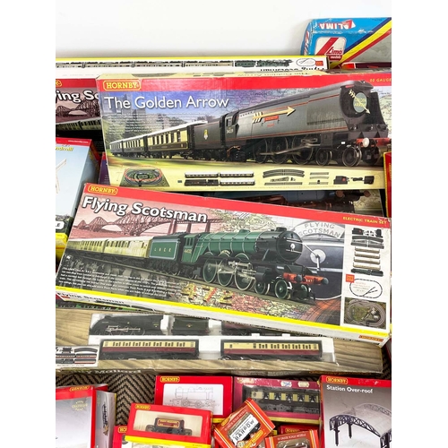 4 - HORNBY MODEL TRAIN SETS, including 'the flying Scotsman', and various others in original boxes along... 