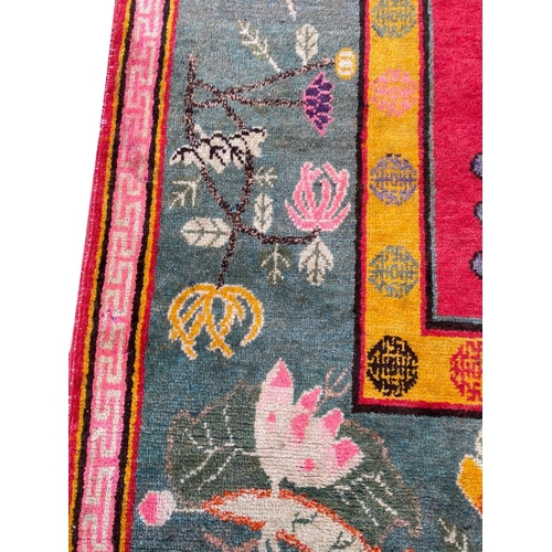 59 - ANTIQUE KHOTAN CARPET, 290cm x 176cm.