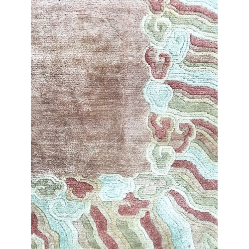 77 - TIBETAN TEMPLE CARPET, 215cm x 121cm.