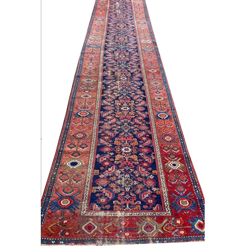 82 - ANTIQUE MALAYER RUNNER, 475cm x 104cm.