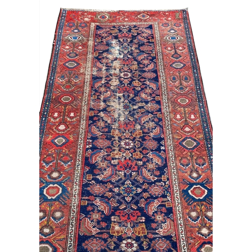 82 - ANTIQUE MALAYER RUNNER, 475cm x 104cm.