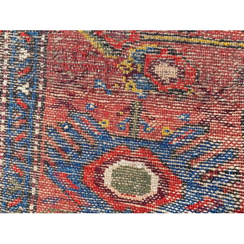 82 - ANTIQUE MALAYER RUNNER, 475cm x 104cm.