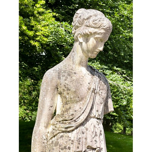 149 - GARDEN STATUE WATER CARRIER, well weathered reconstituted stone on a circular fluted plinth, 227cm H... 