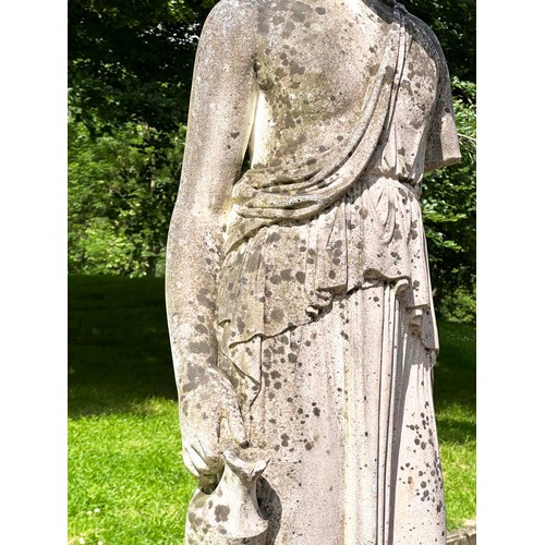 149 - GARDEN STATUE WATER CARRIER, well weathered reconstituted stone on a circular fluted plinth, 227cm H... 