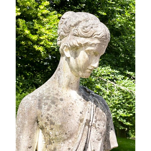 149 - GARDEN STATUE WATER CARRIER, well weathered reconstituted stone on a circular fluted plinth, 227cm H... 