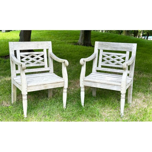 150 - COLONIAL STYLE GARDEN ARMCHAIRS, a pair, nicely weather high grade teak, each with pierced trellis c... 