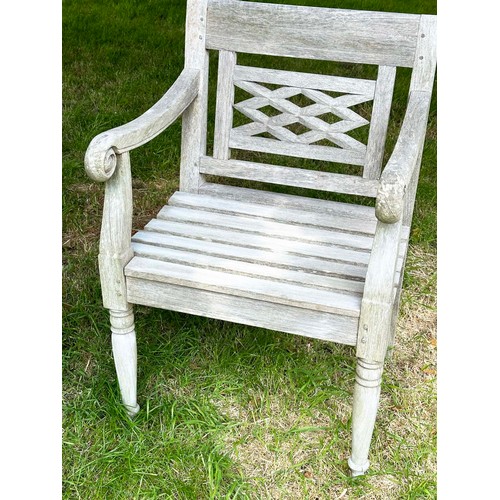 150 - COLONIAL STYLE GARDEN ARMCHAIRS, a pair, nicely weather high grade teak, each with pierced trellis c... 