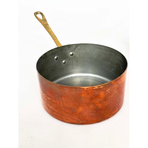 297 - COPPER PANS, a graduated set of five copper and brass, largest 18cm W. (5)