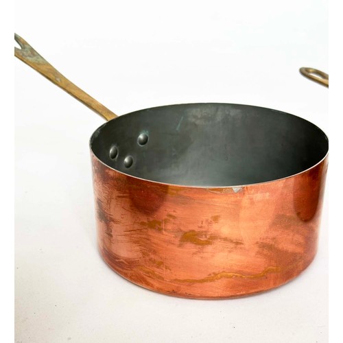 297 - COPPER PANS, a graduated set of five copper and brass, largest 18cm W. (5)
