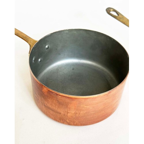297 - COPPER PANS, a graduated set of five copper and brass, largest 18cm W. (5)