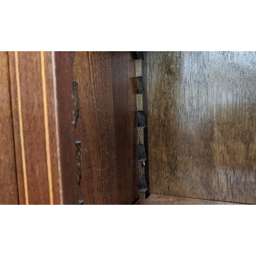 165 - EDWARDIAN SHERATON-STYLE BREAKFRONT LINE INLAID MAHOGANY BOOKCASE, having moulded dentil cornice ove... 