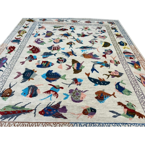 57 - FINE SUZANI FISH DESIGN CARPET, 300cm x 197cm.