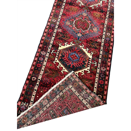 64 - PERSIAN KARAJA LONG RUNNER, 395cm x 72cm.