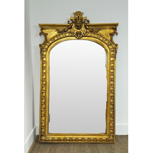 175 - WALL MIRROR, Napoleon III style gilt framed with lion crest and arched bevelled plate, 136cm H x 81c... 