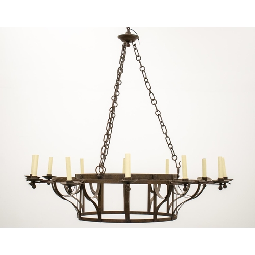 176 - CHANDELIER, early 20th century wrought iron with twelve lights approx 128cm H x 135cm D.