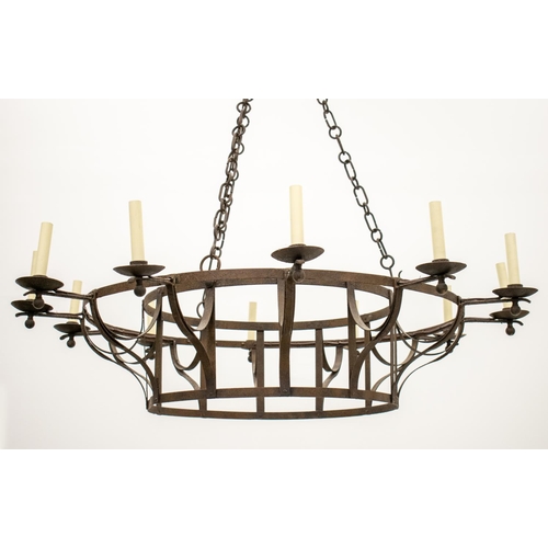 176 - CHANDELIER, early 20th century wrought iron with twelve lights approx 128cm H x 135cm D.