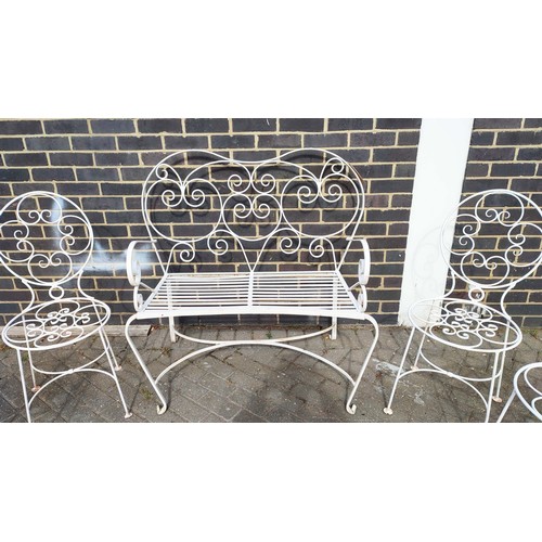 181 - TRADITIONAL GARDEN SUITE, wrought iron comprising a slatted two seater bench and four matching chair... 