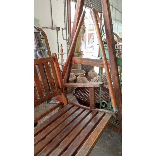 187 - GARDEN SWING SEAT, slatted teak on A frame stretched supports, 195cm H x 150cm W x 103cm D.