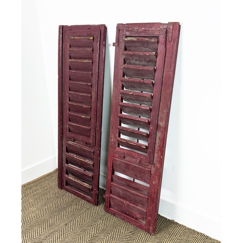 180 - PAIR OF ANTIQUE FRENCH WOODEN WINDOW SHUTTERS, late 19th/early 20th century, rustic red painted fini... 