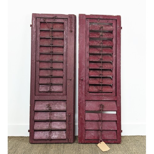 180 - PAIR OF ANTIQUE FRENCH WOODEN WINDOW SHUTTERS, late 19th/early 20th century, rustic red painted fini... 