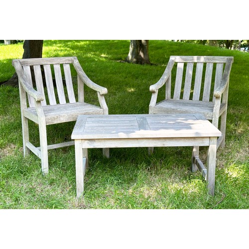 157 - GARDEN ARMCHAIRS, a pair, well weathered teak slatted with downswept scroll arms, 85cm H x 57cm W. (... 