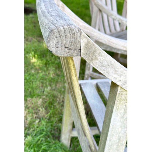 157 - GARDEN ARMCHAIRS, a pair, well weathered teak slatted with downswept scroll arms, 85cm H x 57cm W. (... 