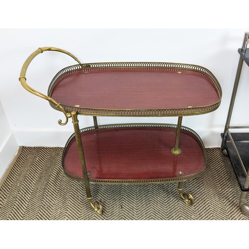 129 - TROLLEY, brass framed, 80cm L x 69cm H, and one other, dark lacquer and chrome, which bears label Tu... 