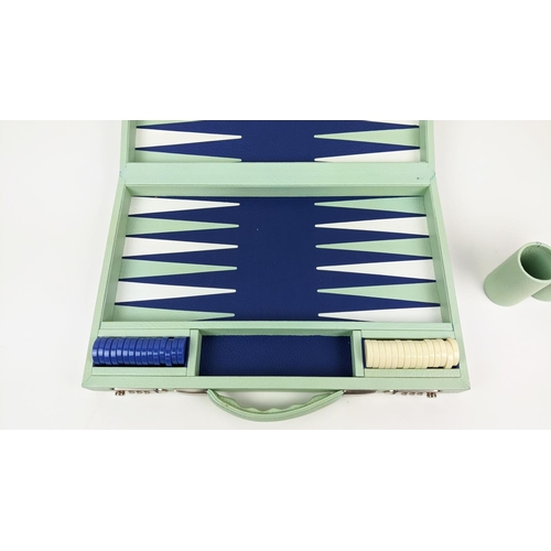 104 - GEOFFREY PARKER BACKGAMMON TRAVEL SET, in eau de nil and blue leather, 29cm x 44cm W when closed.