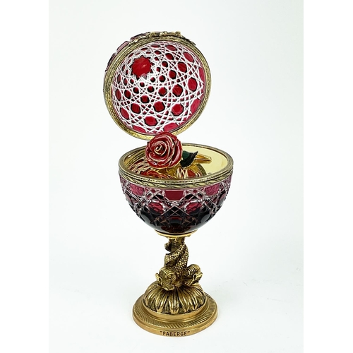 109 - FABERGE 'ROSE' BOHEMIAN CUT GLASS EGG, number 25,  hinged lid opening to reveal enamel rose on gold ... 