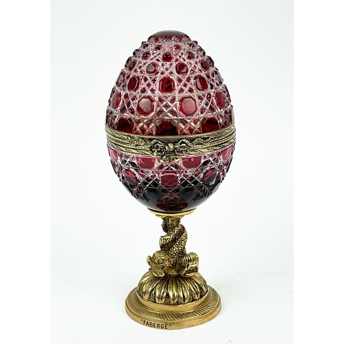 109 - FABERGE 'ROSE' BOHEMIAN CUT GLASS EGG, number 25,  hinged lid opening to reveal enamel rose on gold ... 