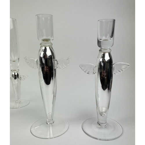 111 - ANGEL CHAMPAGNE GLASSES, a collection of eleven and a near pair of candlesticks, silver with angel w... 