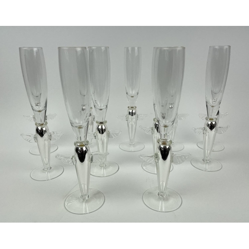 111 - ANGEL CHAMPAGNE GLASSES, a collection of eleven and a near pair of candlesticks, silver with angel w... 