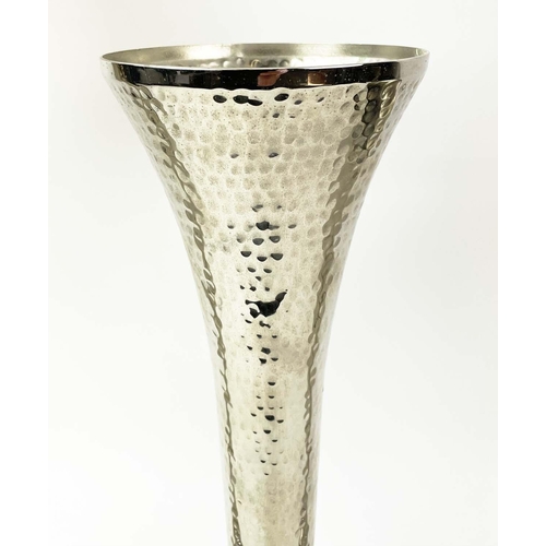 120 - FLUTED VASES, a graduated set of three, in hammered metal, 51cm H. (3)