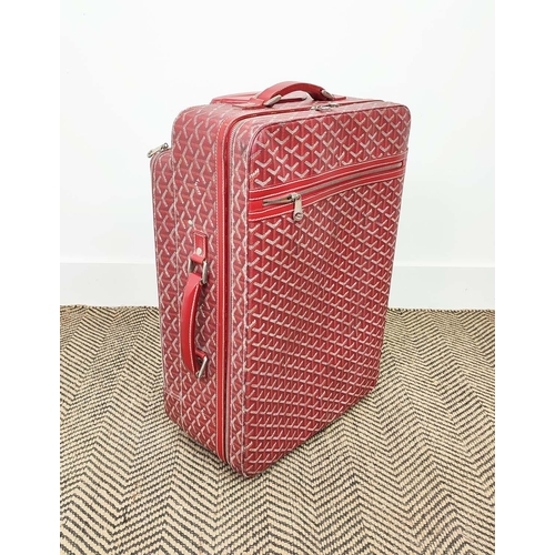 13 - GOYARD TROLLEY, iconic Goyardine red coated canvas exterior with leather trimming and handles, retra... 