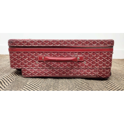 13 - GOYARD TROLLEY, iconic Goyardine red coated canvas exterior with leather trimming and handles, retra... 