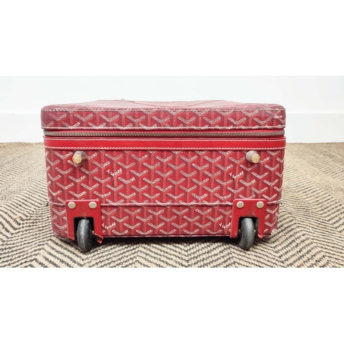 13 - GOYARD TROLLEY, iconic Goyardine red coated canvas exterior with leather trimming and handles, retra... 