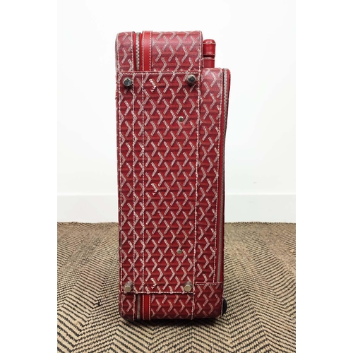 13 - GOYARD TROLLEY, iconic Goyardine red coated canvas exterior with leather trimming and handles, retra... 