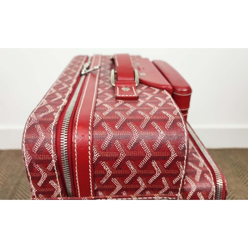 13 - GOYARD TROLLEY, iconic Goyardine red coated canvas exterior with leather trimming and handles, retra... 