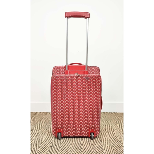 13 - GOYARD TROLLEY, iconic Goyardine red coated canvas exterior with leather trimming and handles, retra... 