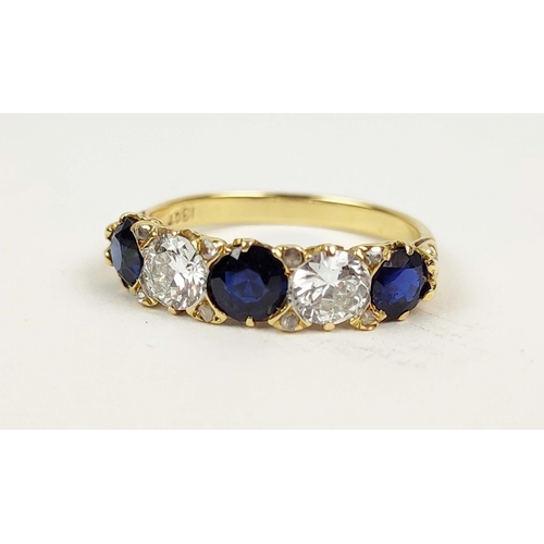 148 - AN 18CT GOLD FIVE STONE DIAMOND AND SAPPHIRE DRESS RING, set with three sapphires and two
diamonds, ... 