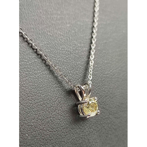 149 - A DIAMOND SOLITAIRE WHITE METAL PENDANT NECKLACE, the round brilliant cut diamond of
approximately 0... 